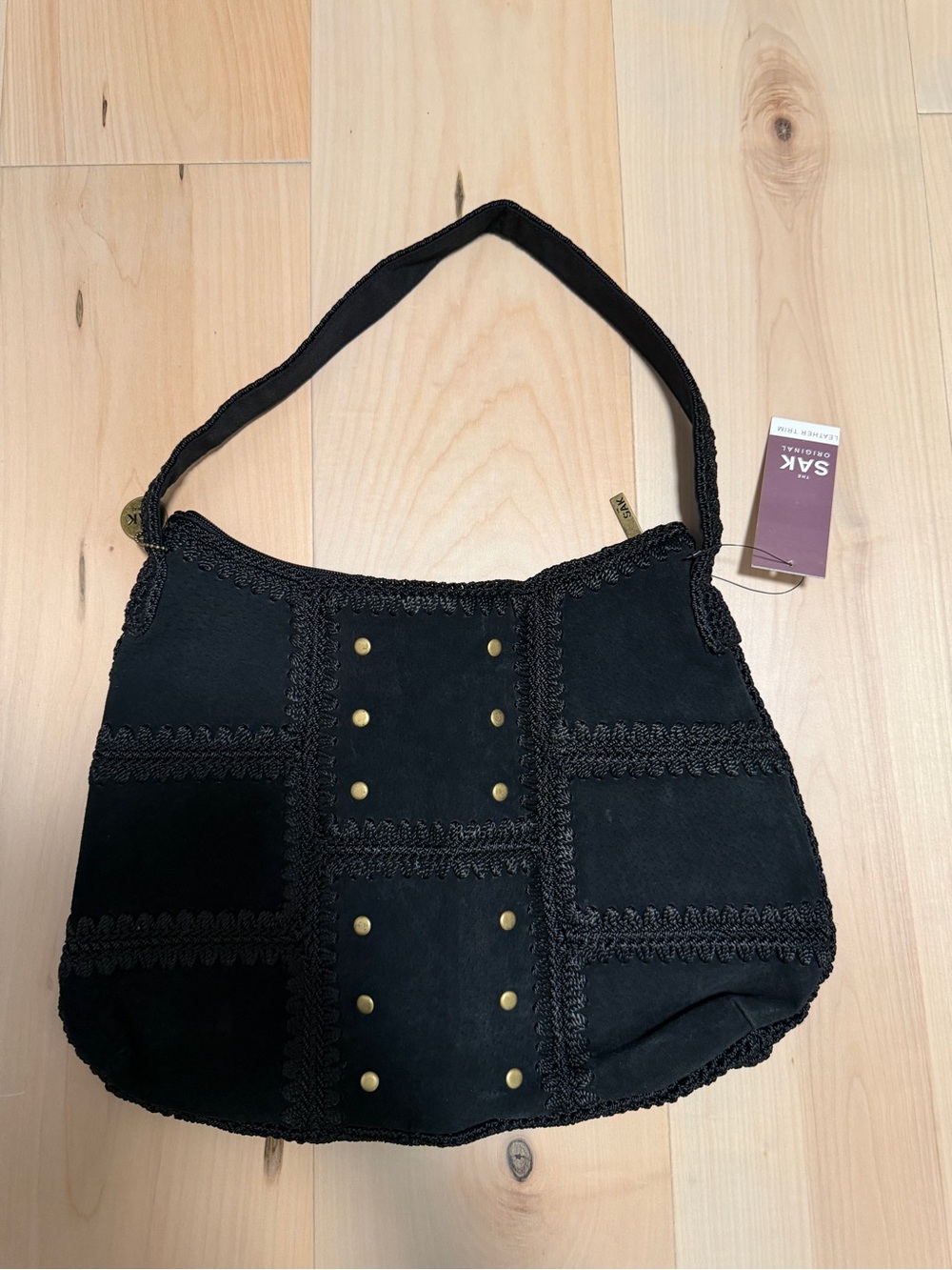 The Sak Black Suede Shoulder Bag with Braided Trim and Studs